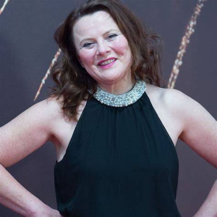 Does Monica Dolan have a twin?