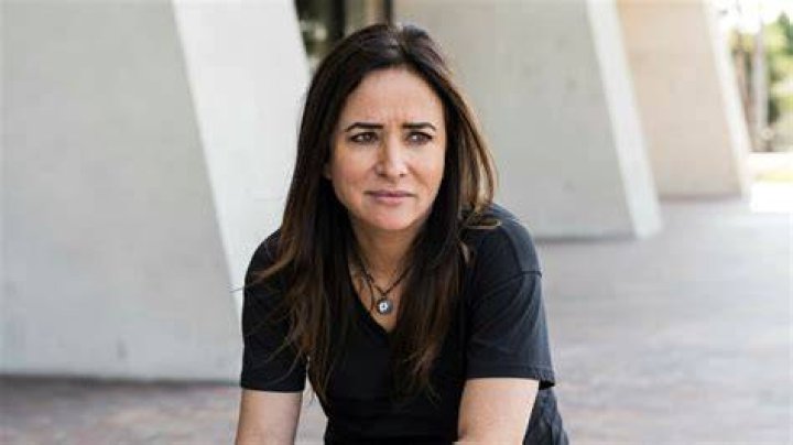 Pamela Adlon: Single, net worth, tattoos, smoking & body measurements