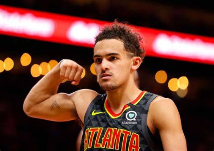 Trae Young: Wife, net worth, tattoos, smoking & body facts